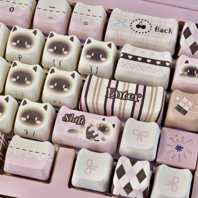 Pink Siamese Cat keycaps installed on a mechanical keyboard, showing the adorable aesthetic in a desktop setup.