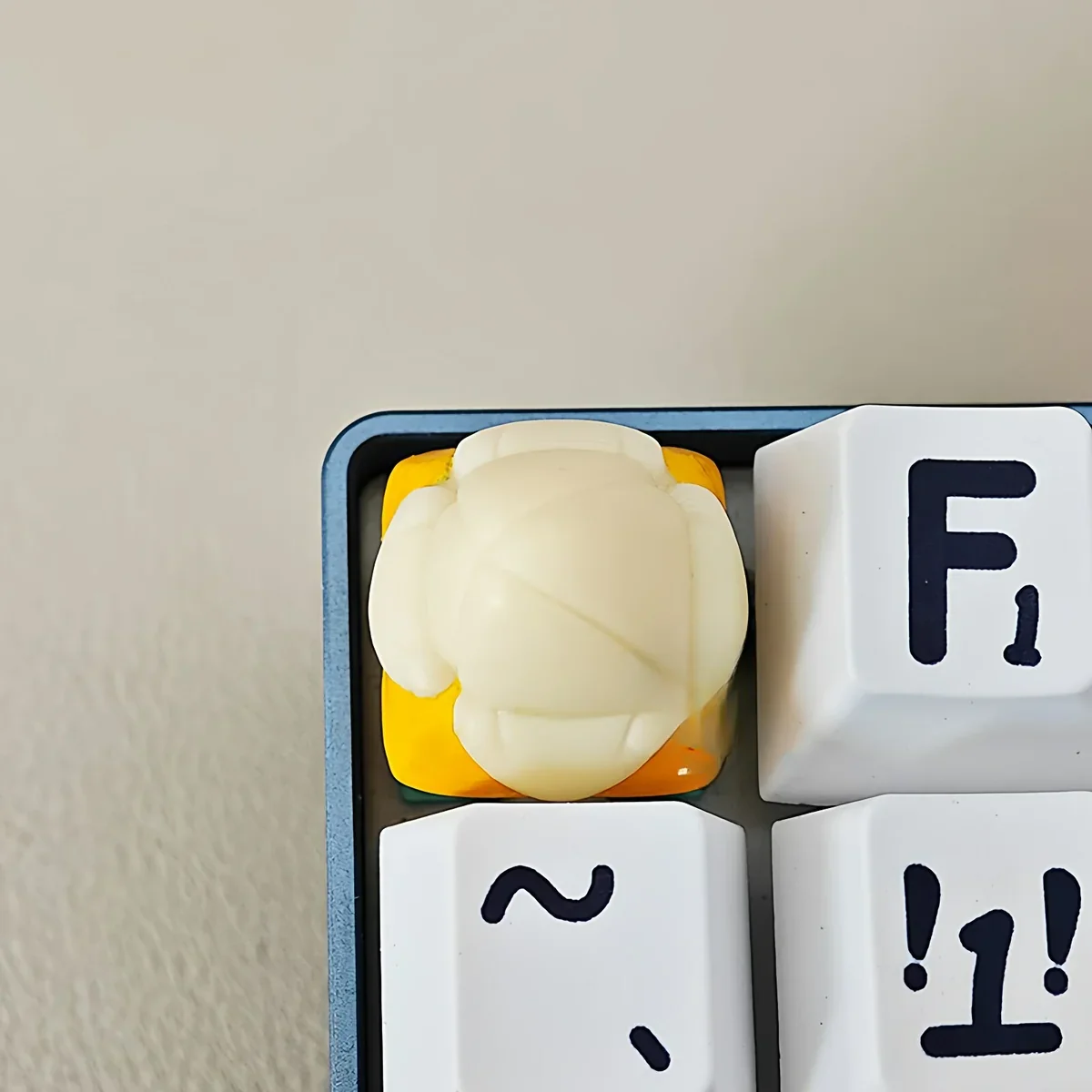 Whimsical Banana Keycap adding a playful, tropical accent to a desk setup