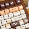 Several Puppy Squad keycaps arranged playfully, emphasizing the adorable cartoon theme.