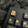 Reflective surface of a polished Copper keycap, showing its mirror-like finish