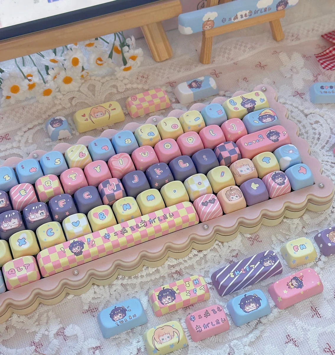 Assortment of Rikka Takanashi novelty keycaps, including spacebar and modifiers