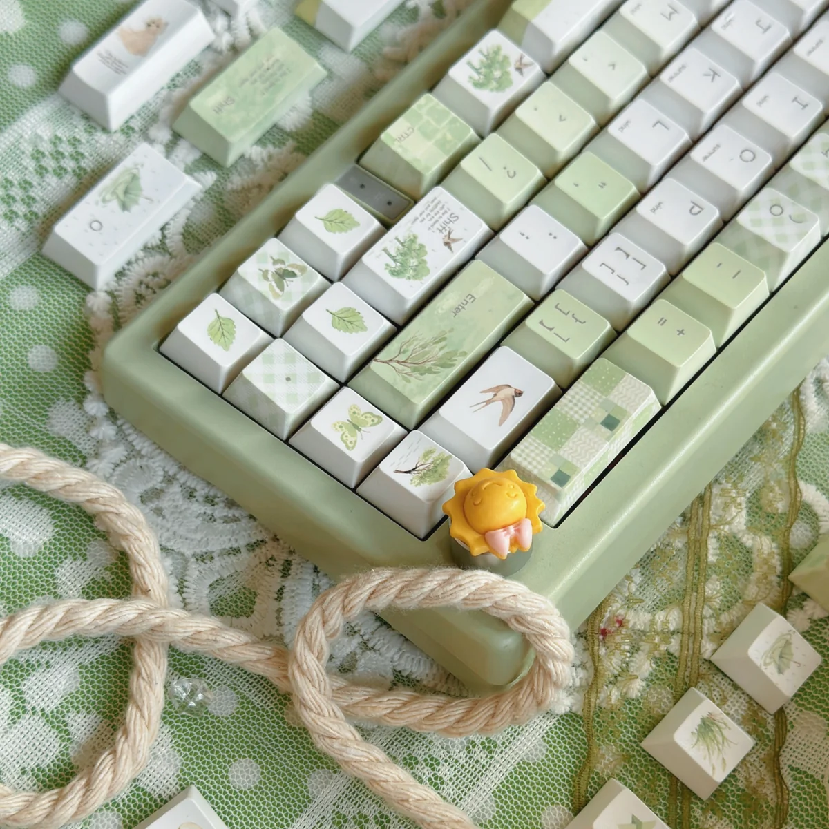 Summer Rain keycaps arranged to show the serene color transitions and aesthetic.