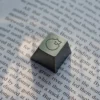 Serene sleeping cat artisan keycap on an ESC key position