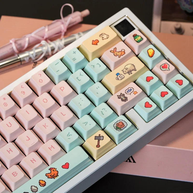 Detailed view of Stardew Valley pixel art on keycaps, showcasing iconic game elements