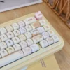 Sweet Treat Cake keycaps in pastel dessert theme on a white keyboard