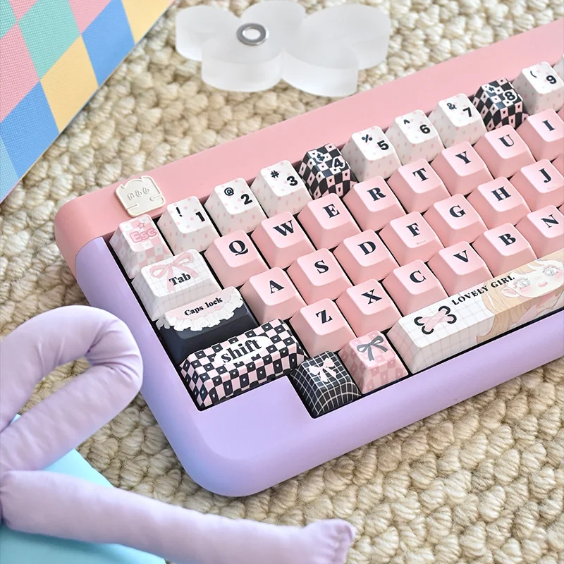 Close-up of dye-sublimated legends on Sweetheart Pink PBT keycaps