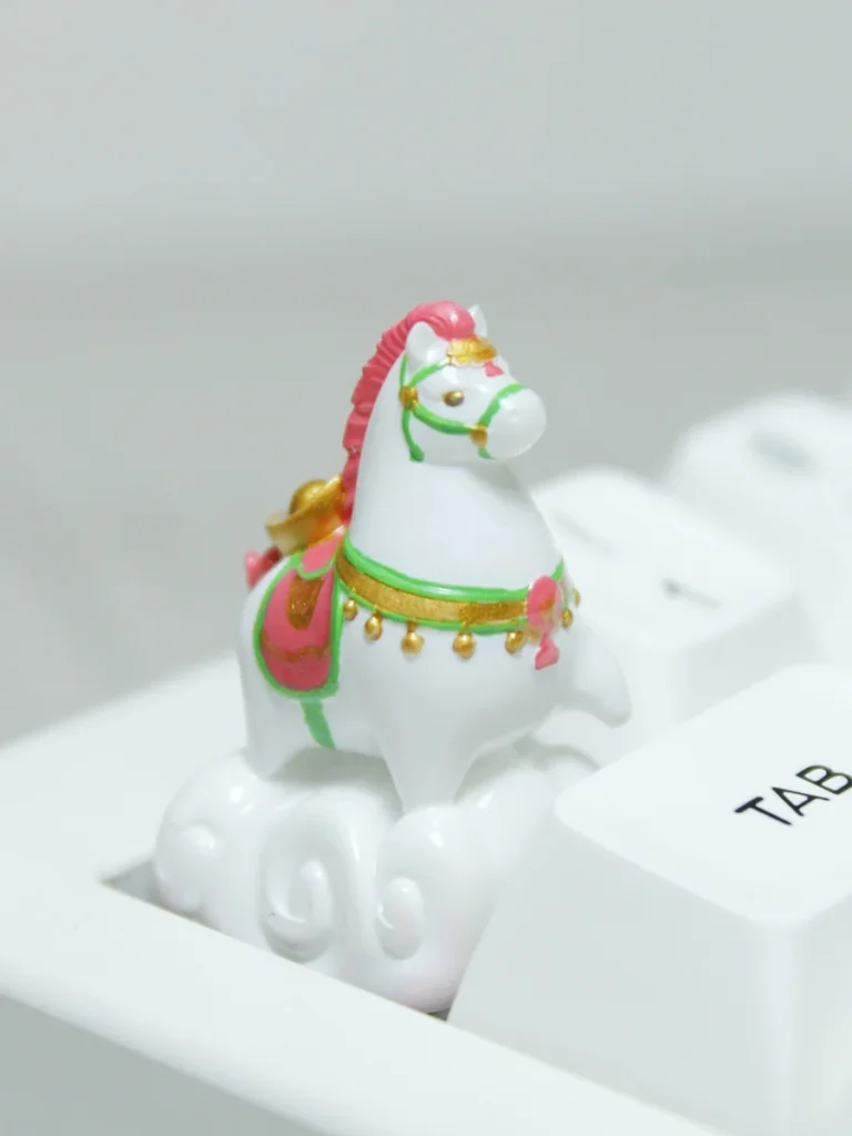 Auspicious Horse Keycap with subtle backlighting, emphasizing its symbolic good fortune.