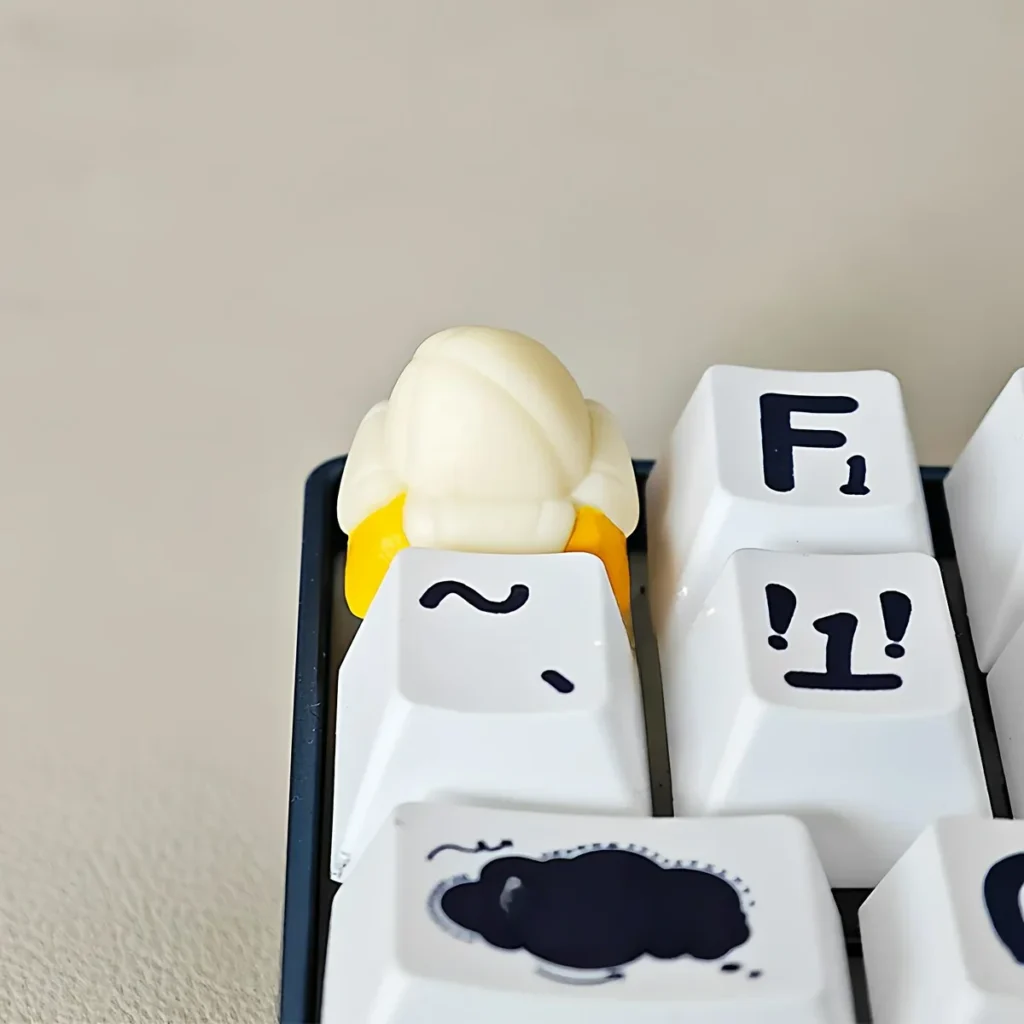 Handcrafted Whimsical Banana Resin Keycap on a mechanical keyboard