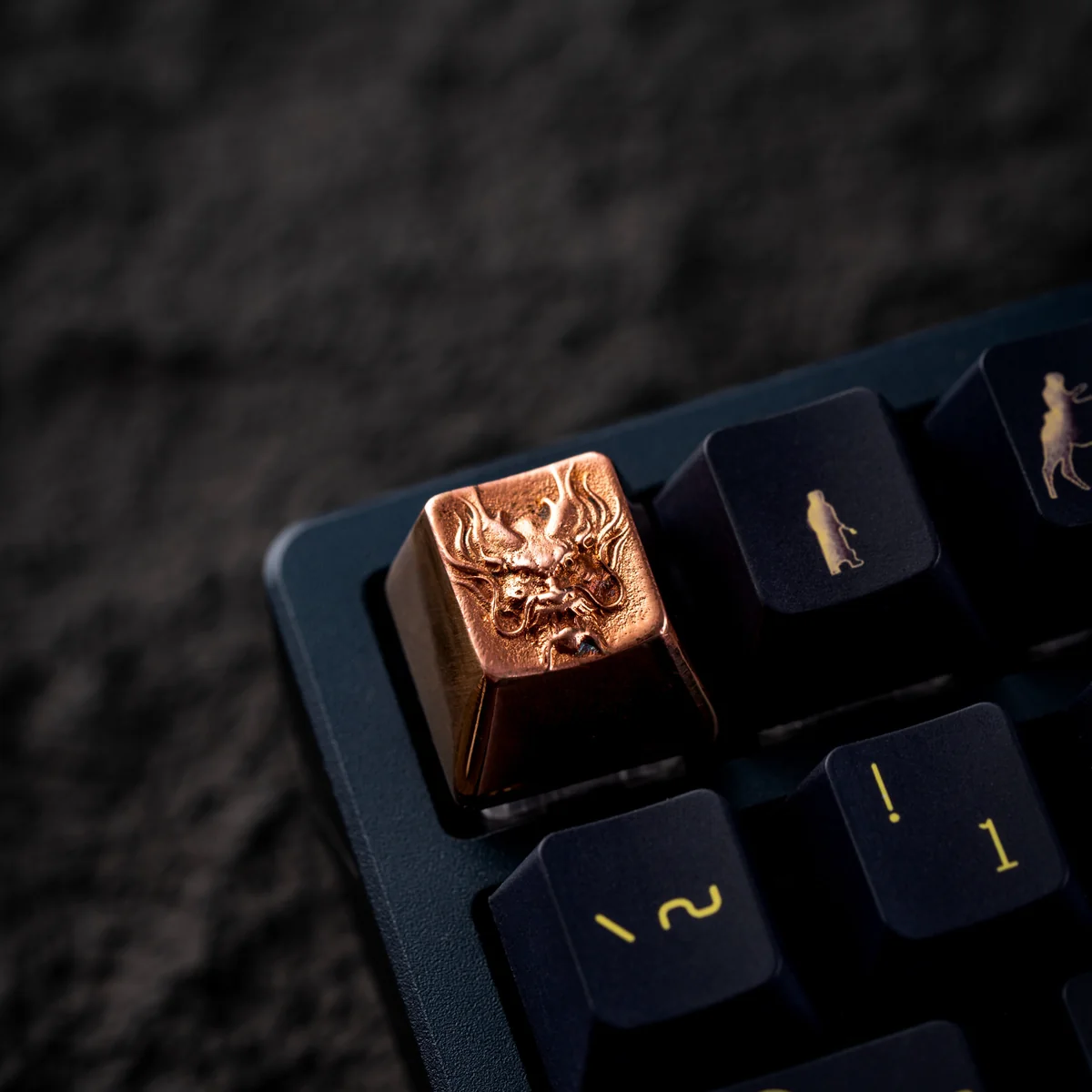 The White Copper Mythical Dragon Keycap illuminating a keyboard setup.