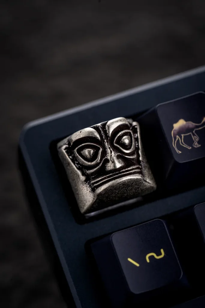 Sanxingdui keycap positioned as an accent key on a keyboard layout