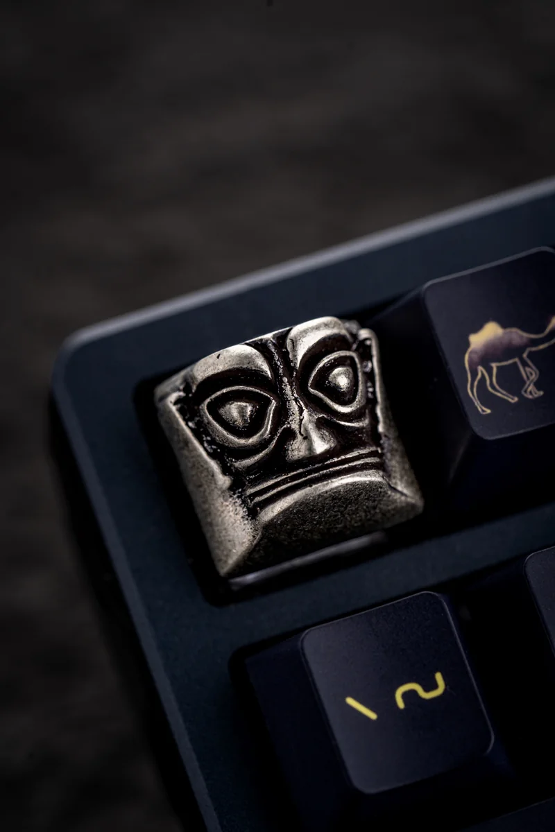 Sanxingdui keycap positioned as an accent key on a keyboard layout