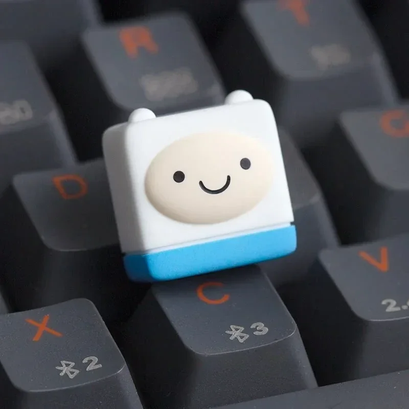 Adventure Time Finn artisan keycap on a mechanical keyboard with backlighting