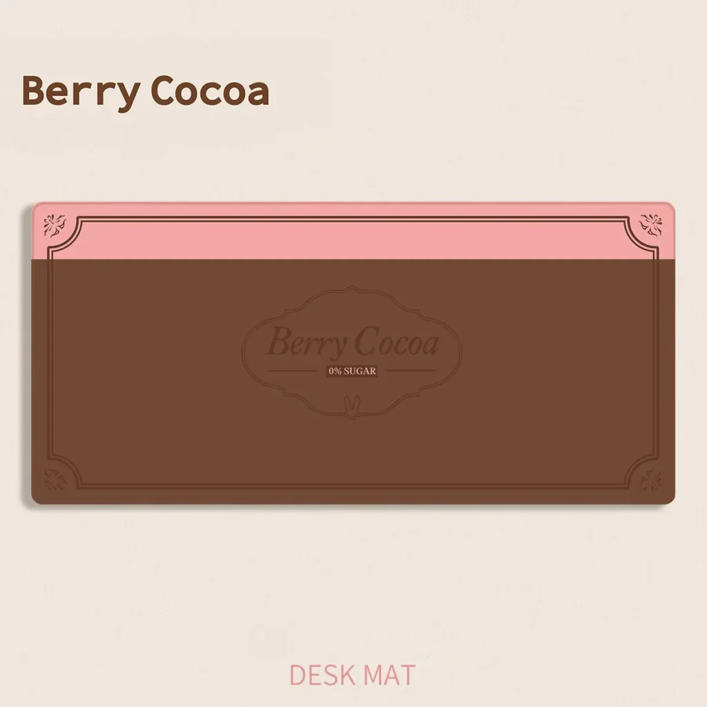 Berry Cocoa Desk Mat on a desk showcasing warm brown and pink tones