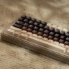 Close-up view of a Berry Cocoa keycap, highlighting the dye-sublimated legends and PBT texture.