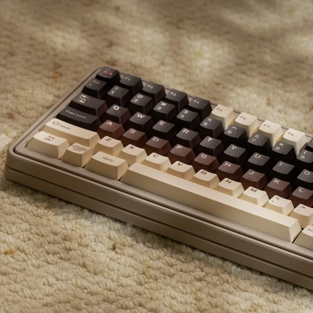 Close-up view of a Berry Cocoa keycap, highlighting the dye-sublimated legends and PBT texture.