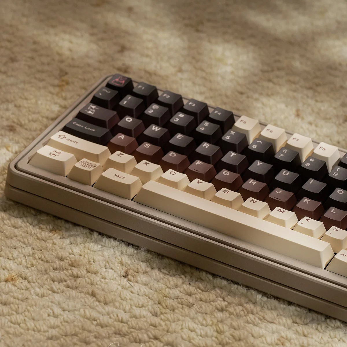 Close-up view of a Berry Cocoa keycap, highlighting the dye-sublimated legends and PBT texture.