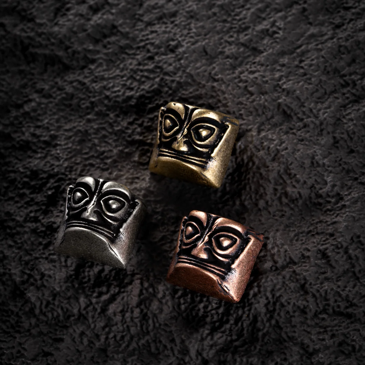 Side view of the Sanxingdui keycap showing Cherry profile and copper texture