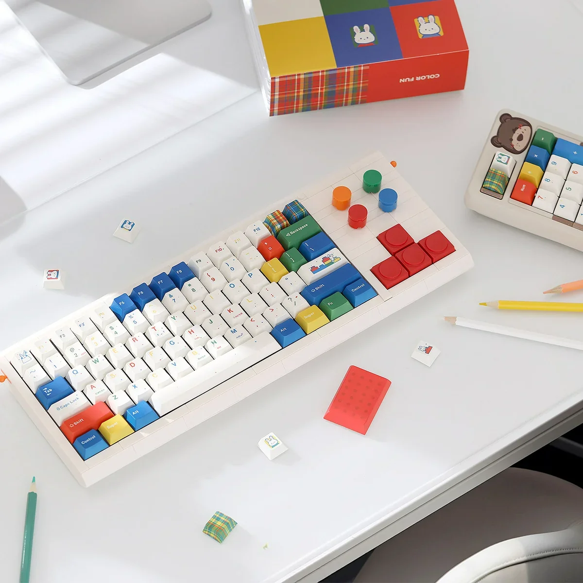 Dopamine Rabbit PBT Keycap Set on a white keyboard, showcasing whimsical rabbit designs and vibrant colors.