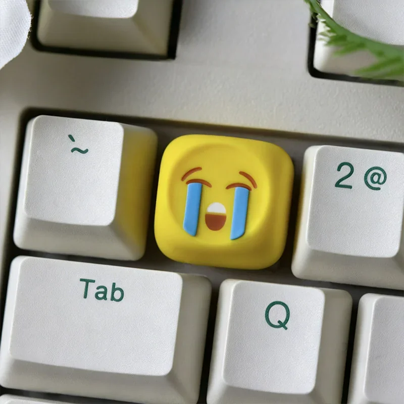 Angle view of Emoji Series Artisan Keycaps Handcrafted Resin showing color layering and layout presence