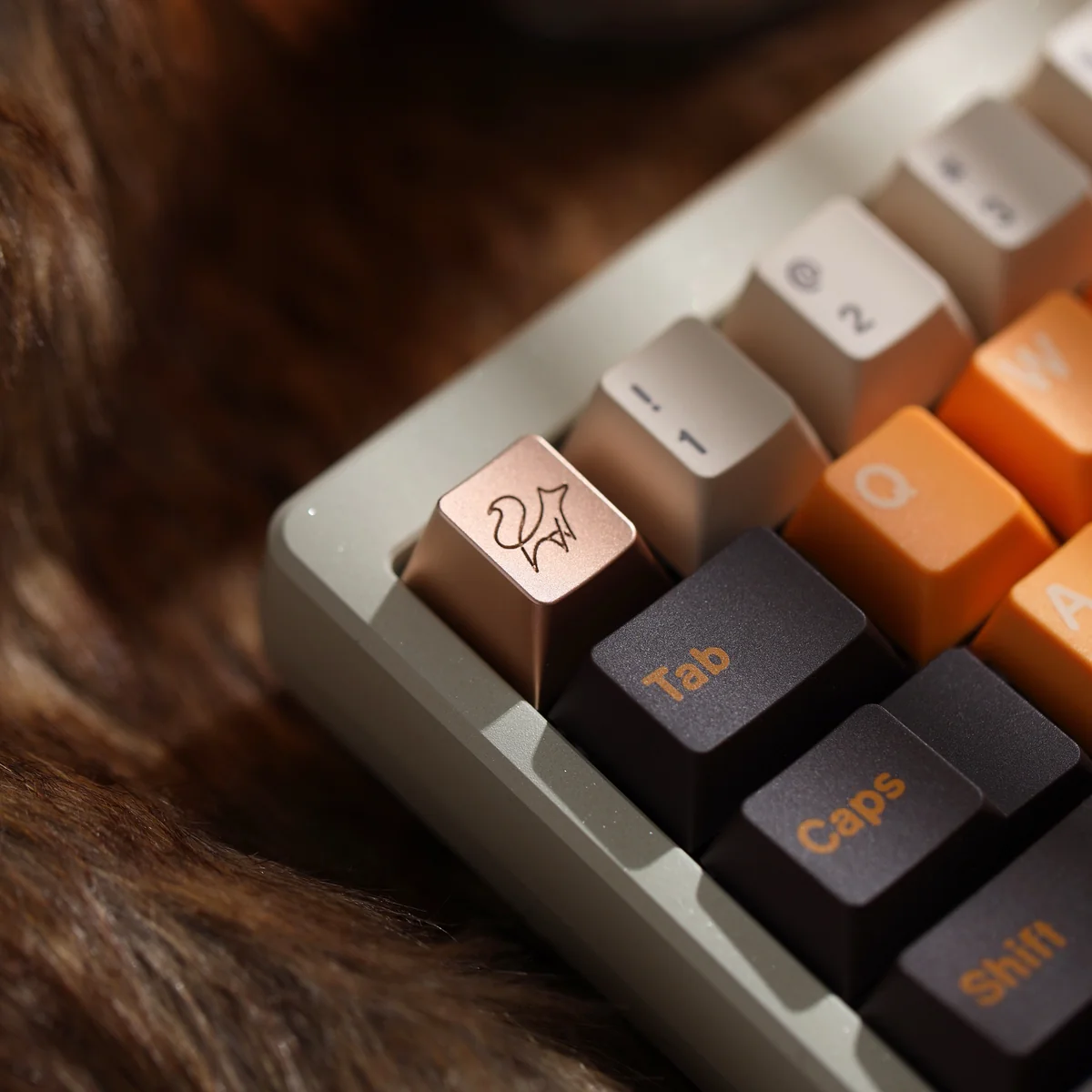 Detailed shot of the Fox Keycap's precision-machined intricate lines and anodized finish.