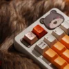 Elegant Fox CNC Aluminum Keycap in vibrant red, showcasing intricate design on a mechanical keyboard.