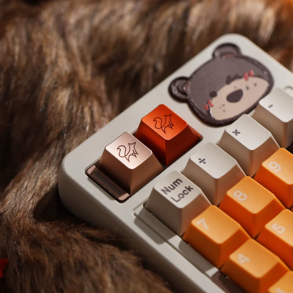 Elegant Fox CNC Aluminum Keycap in vibrant red, showcasing intricate design on a mechanical keyboard.