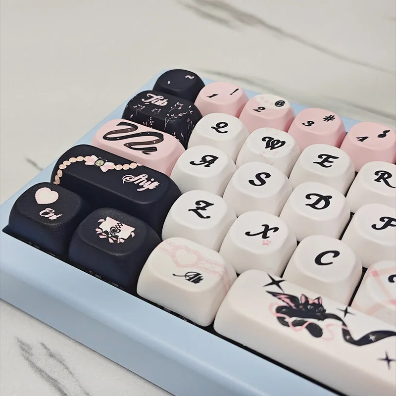 Detail view of heart accent on Sweetheart Black Cat keycap