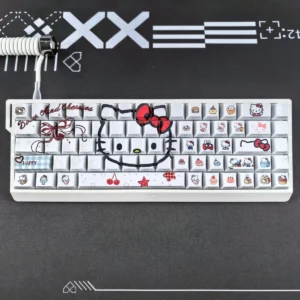 Hello Kitty PBT keycap set on a white mechanical keyboard, showcasing backlit legends.