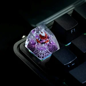 Hollow Knight Hornet keycap on a backlit mechanical keyboard