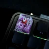 Close-up of hand-painted Hornet details on translucent resin keycap