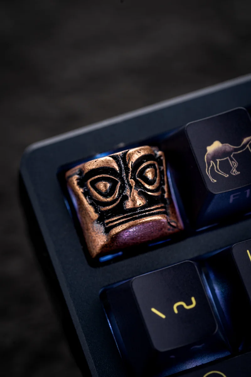 Macro shot highlighting the intricate details and craftsmanship of the copper keycap