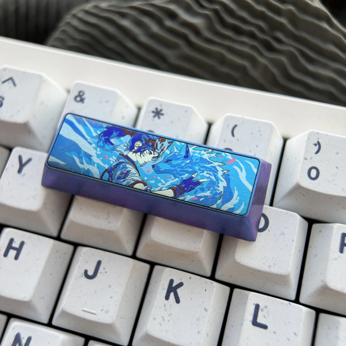 Close-up of Kiriko keycap's CNC-machined titanium detail