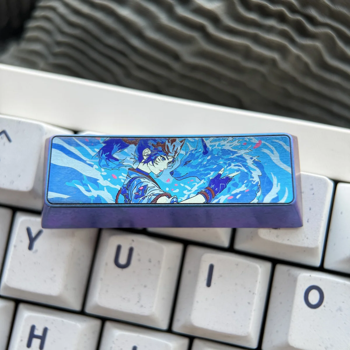 Side profile of Kiriko titanium keycap demonstrating durability