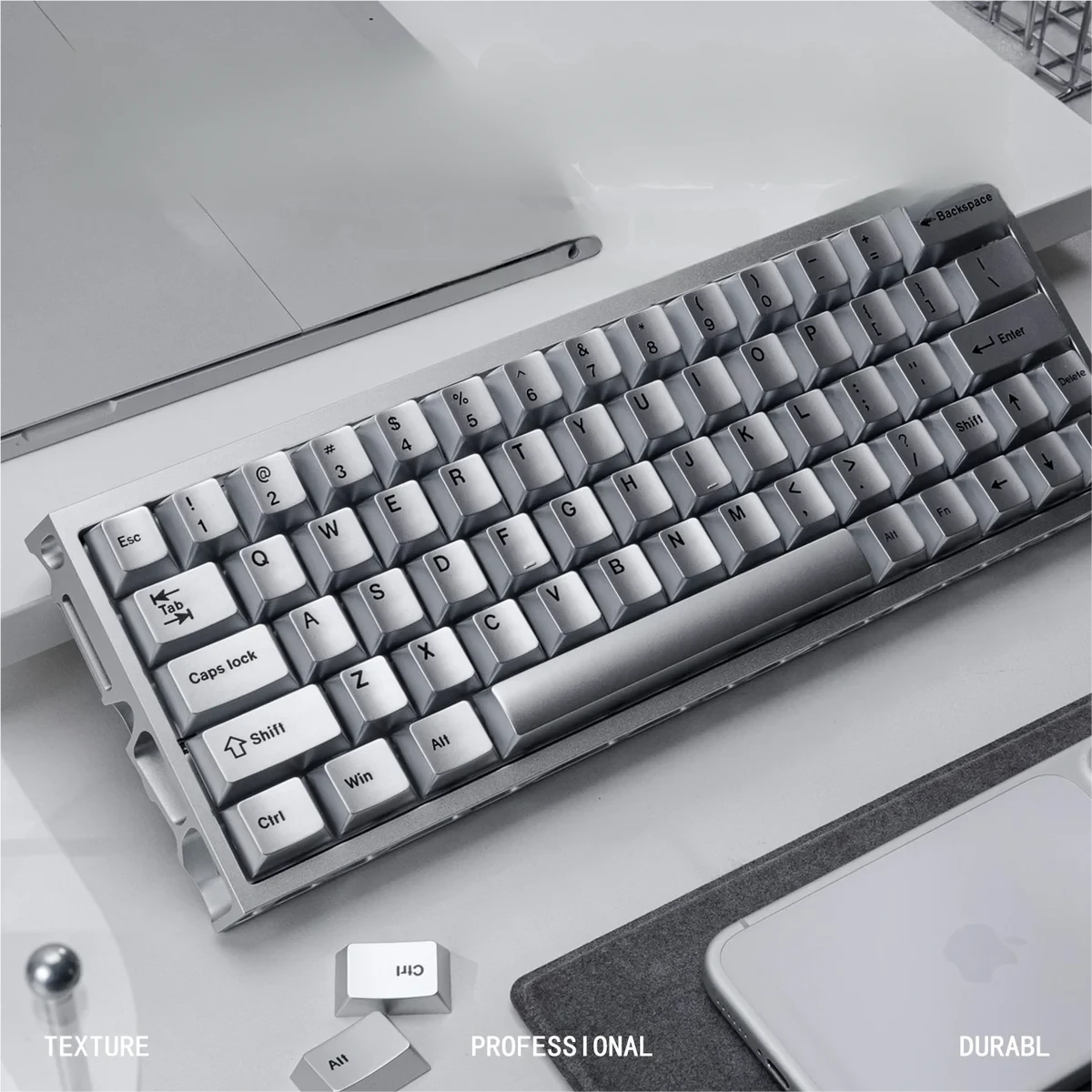Close-up of a Metallic Silver PBT keycap, highlighting dye-sublimated legend clarity