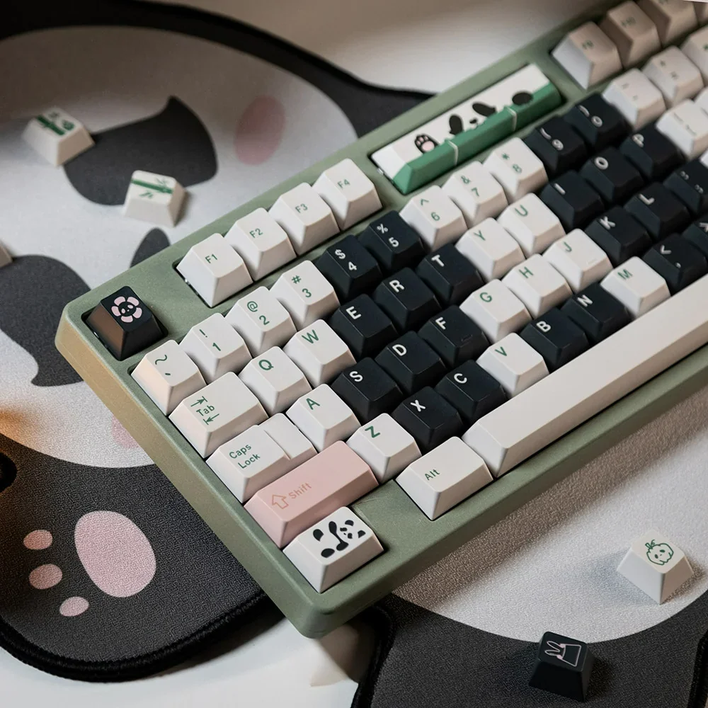 Panda keycap set from an ergonomic angle, highlighting Cherry profile