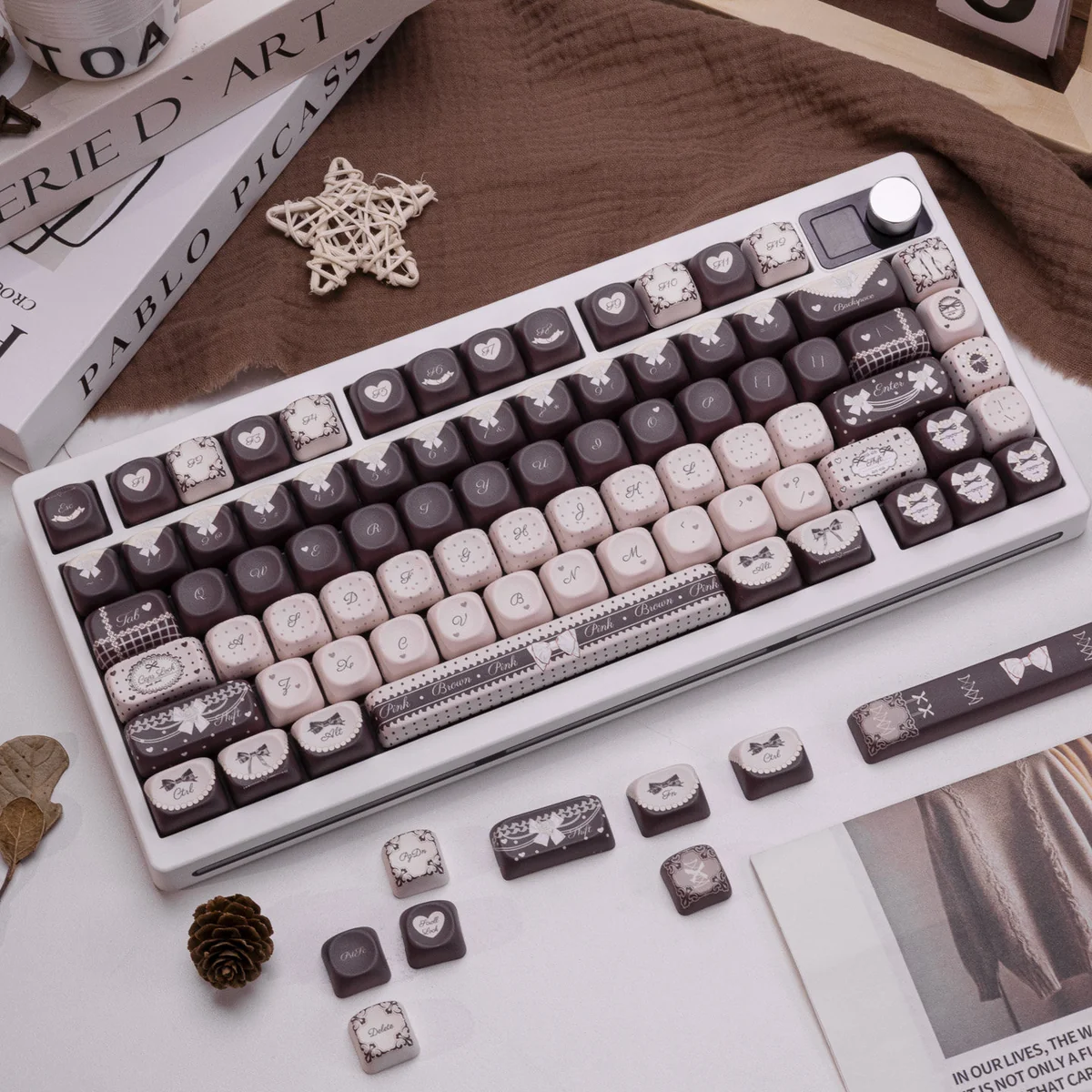Close-up of PBT dye-sublimated keycaps with Lolita cocoa patterns
