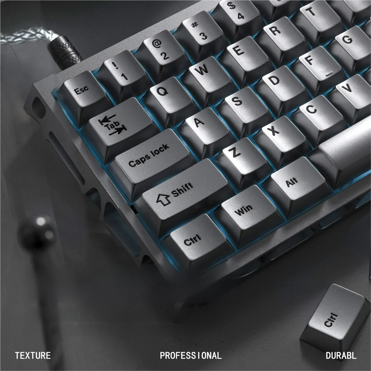 Detail shot of the PBT material texture and metallic sheen of the keycaps