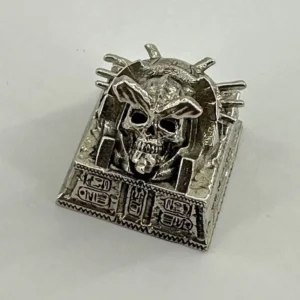 Angle view of Pharaoh Punk Skull Keycaps Handcrafted copper showing color layering and layout presence