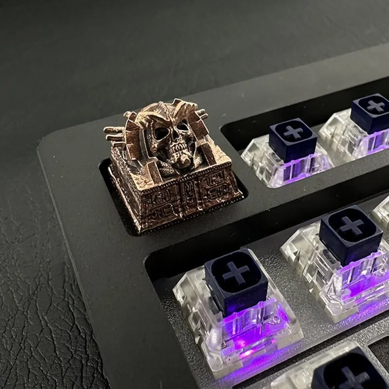 Side profile of Pharaoh Punk Skull Keycaps Handcrafted copper showing artisan keycap shape and fit