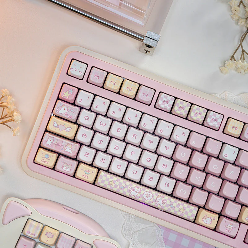 Close-up of Pixel Cat keycaps, highlighting the dye-sublimated legends and PBT texture.