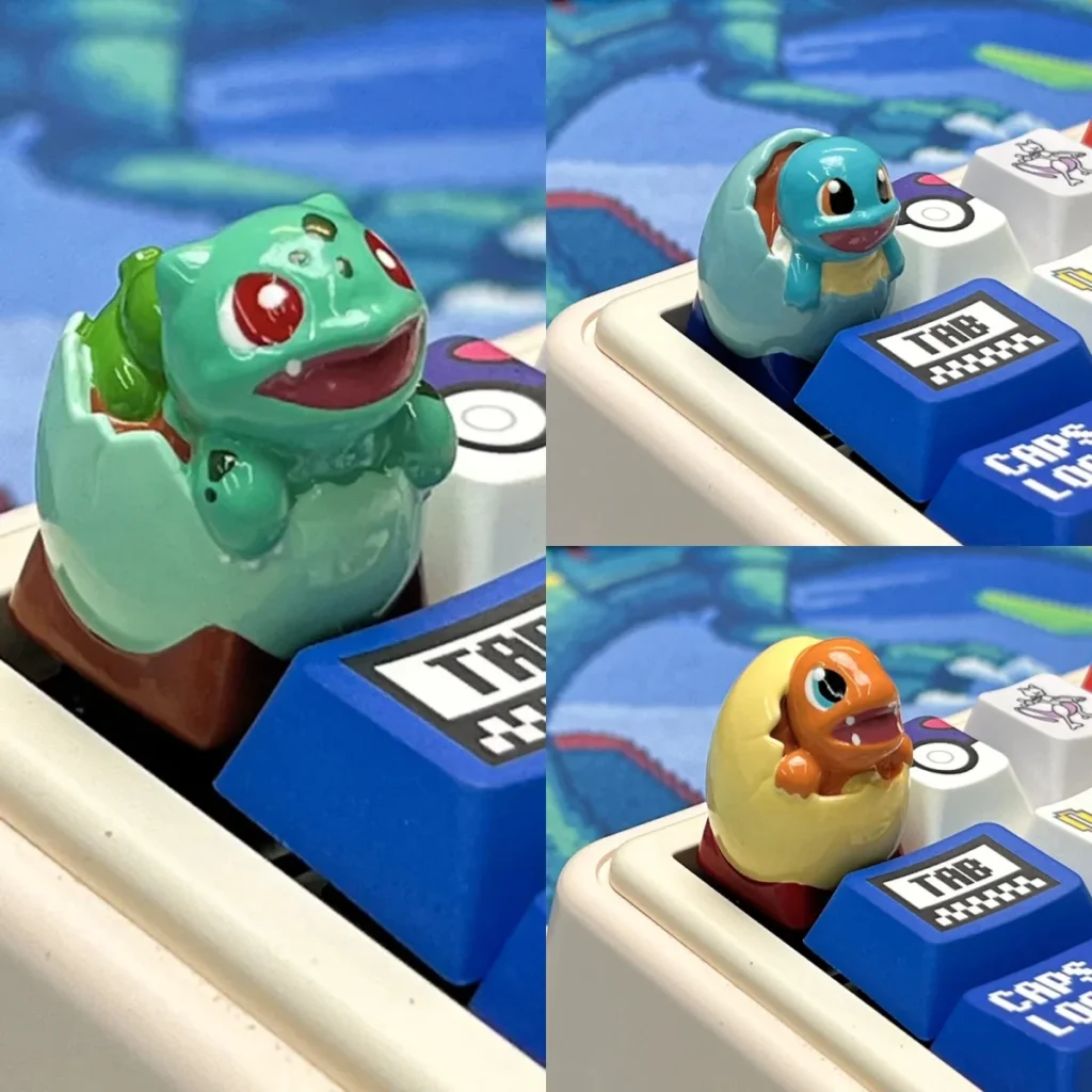 Handcrafted Charmander keycap emerging from an egg, vibrant orange resin artisan keycap for mechanical keyboards.