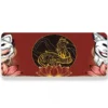 Spirit Fox Desk Mat with ancient bronze art on a desk