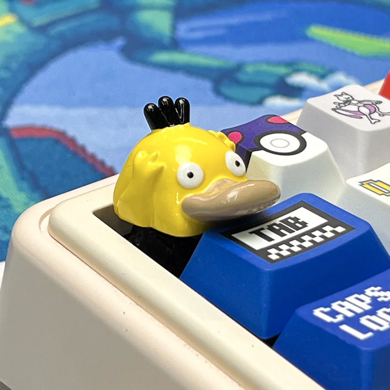 Side profile of vibrant Psyduck artisan keycap, illustrating its Cherry profile and resin craftsmanship