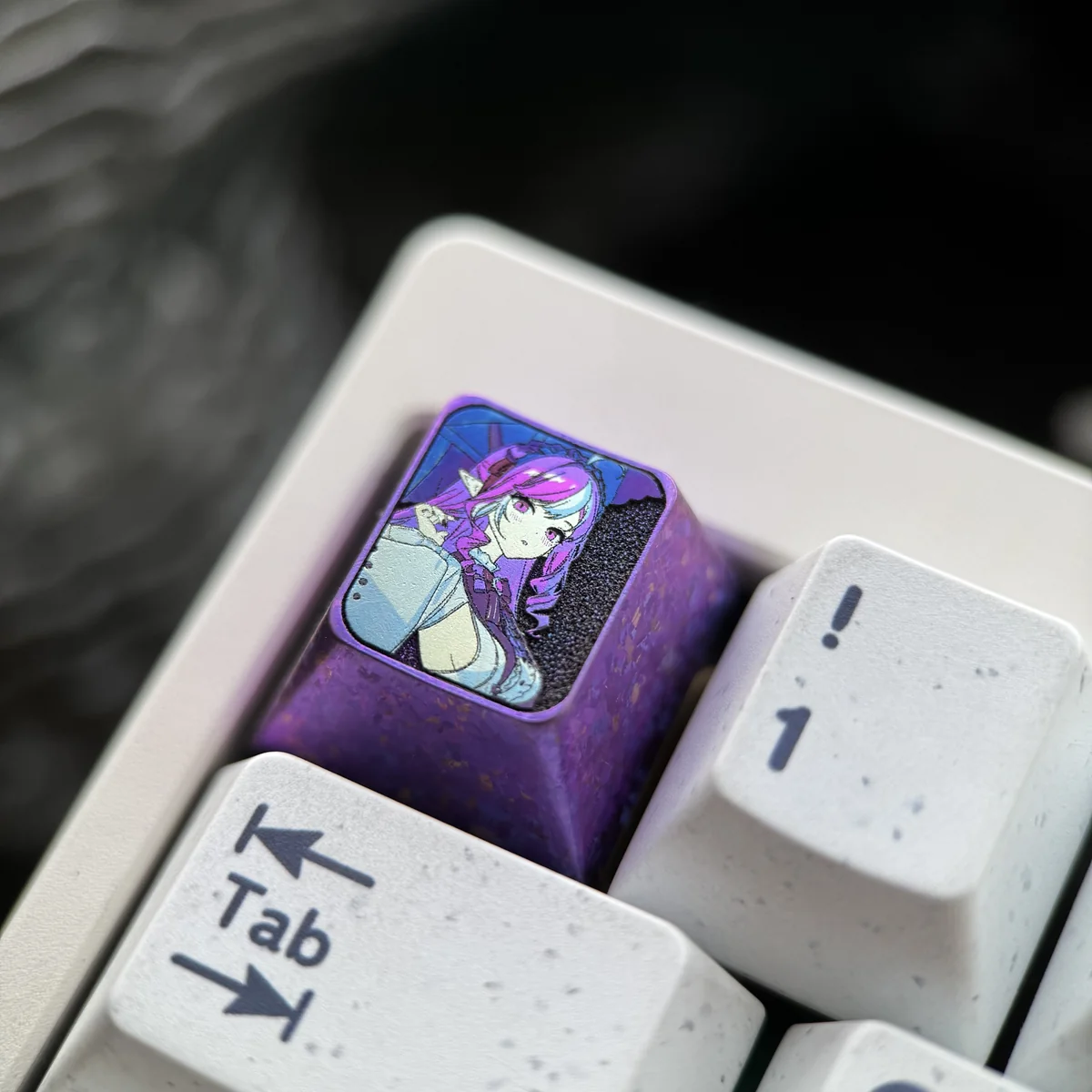 Close-up of intricate Vivian Banshee design on metal keycap