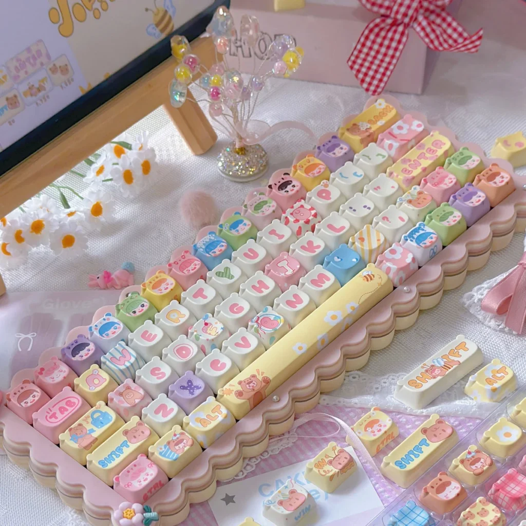 Whimsical Bear Doll PBT MOA Keycap Set on a mechanical keyboard, showcasing adorable bear designs and pastel colors.