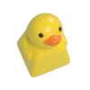 Side profile of the playful yellow duck artisan keycap, showcasing detailed resin work.