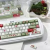 147-key apple keycap set arranged on a desk mat