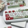 Close-up of apple motif PBT keycaps in Cherry profile