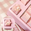 Handmade My Melody artisan keycap in pastel pink clay mounted as an accent key on a mechanical keyboard