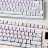 Side profile of Artistic Ghost Haha Series Playful ghost theme showing keycap set shape and fit
